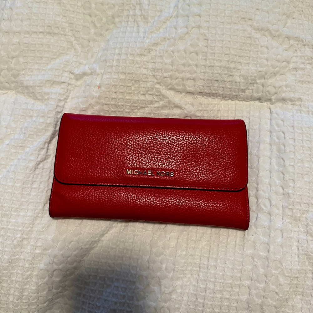 Michael Kors Large Pebbled Leather Tri-Fold Wallet in color Red